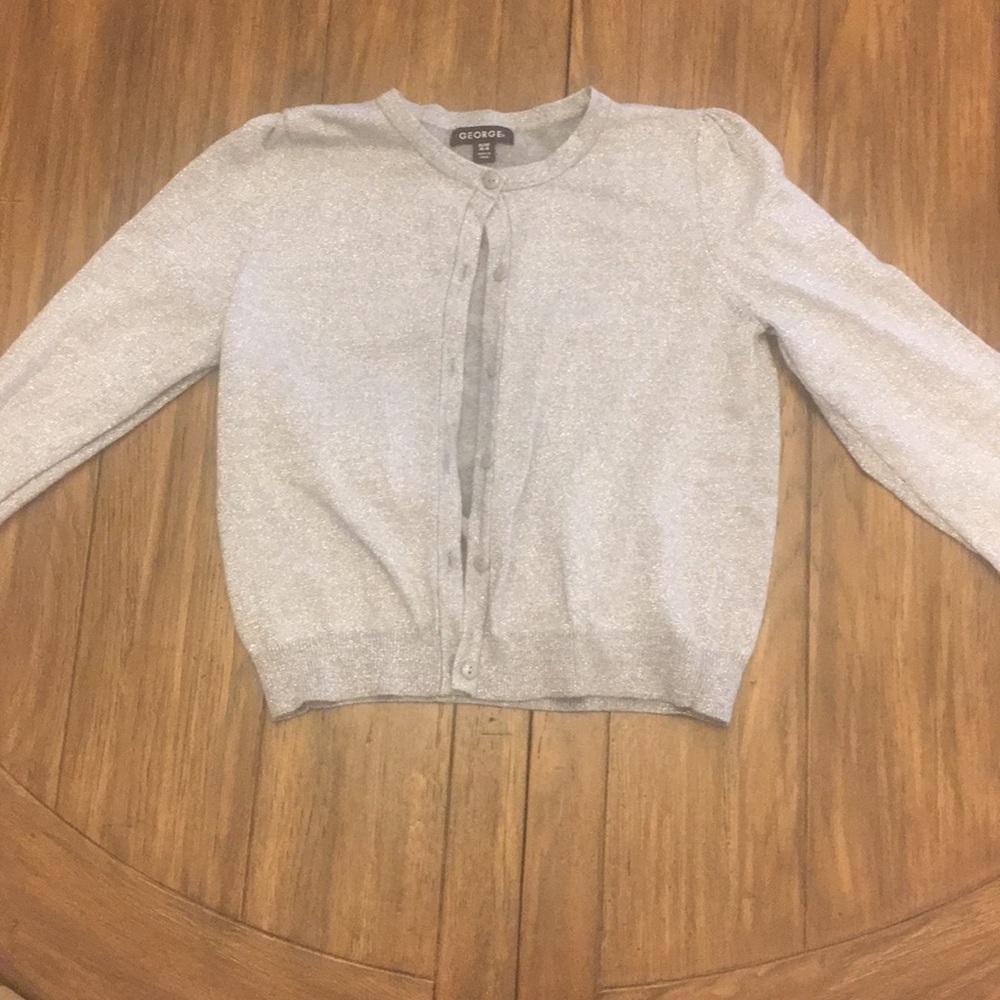 A silver shimmer sweater